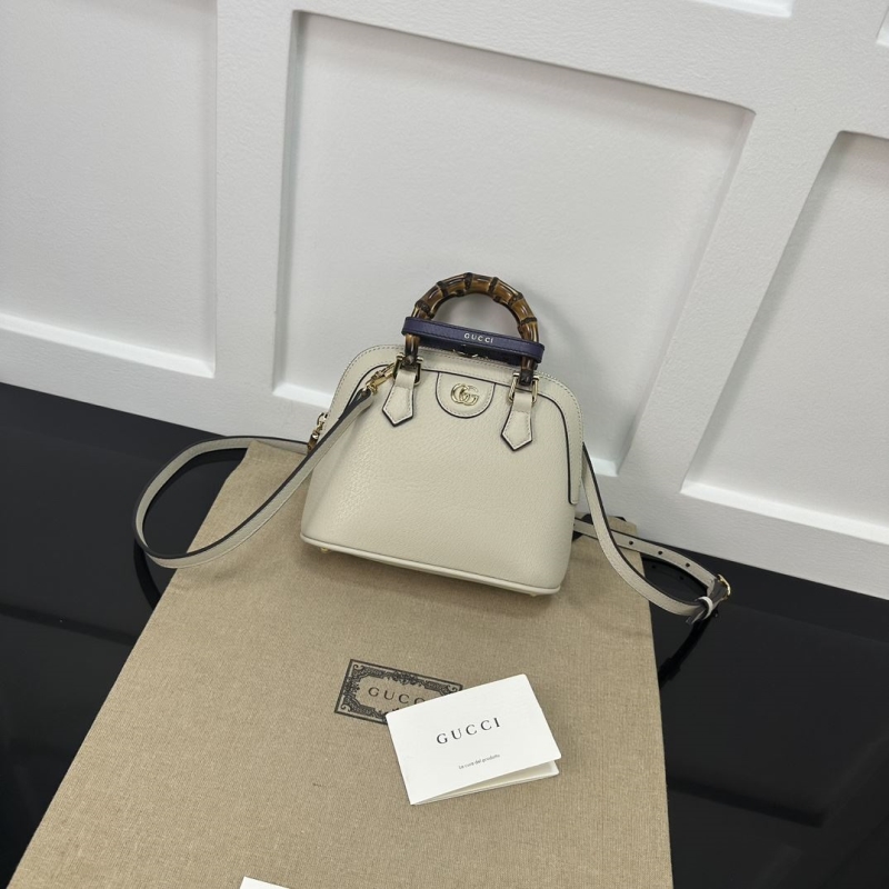 G*u*i top handle bags